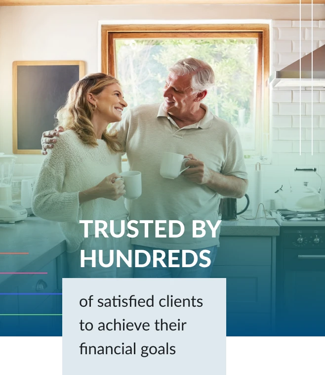 An older couple standing and smiling in their modern home kitchen. A text overlay says trusted by hundreds of satisfied clients to achieve their financial goals.